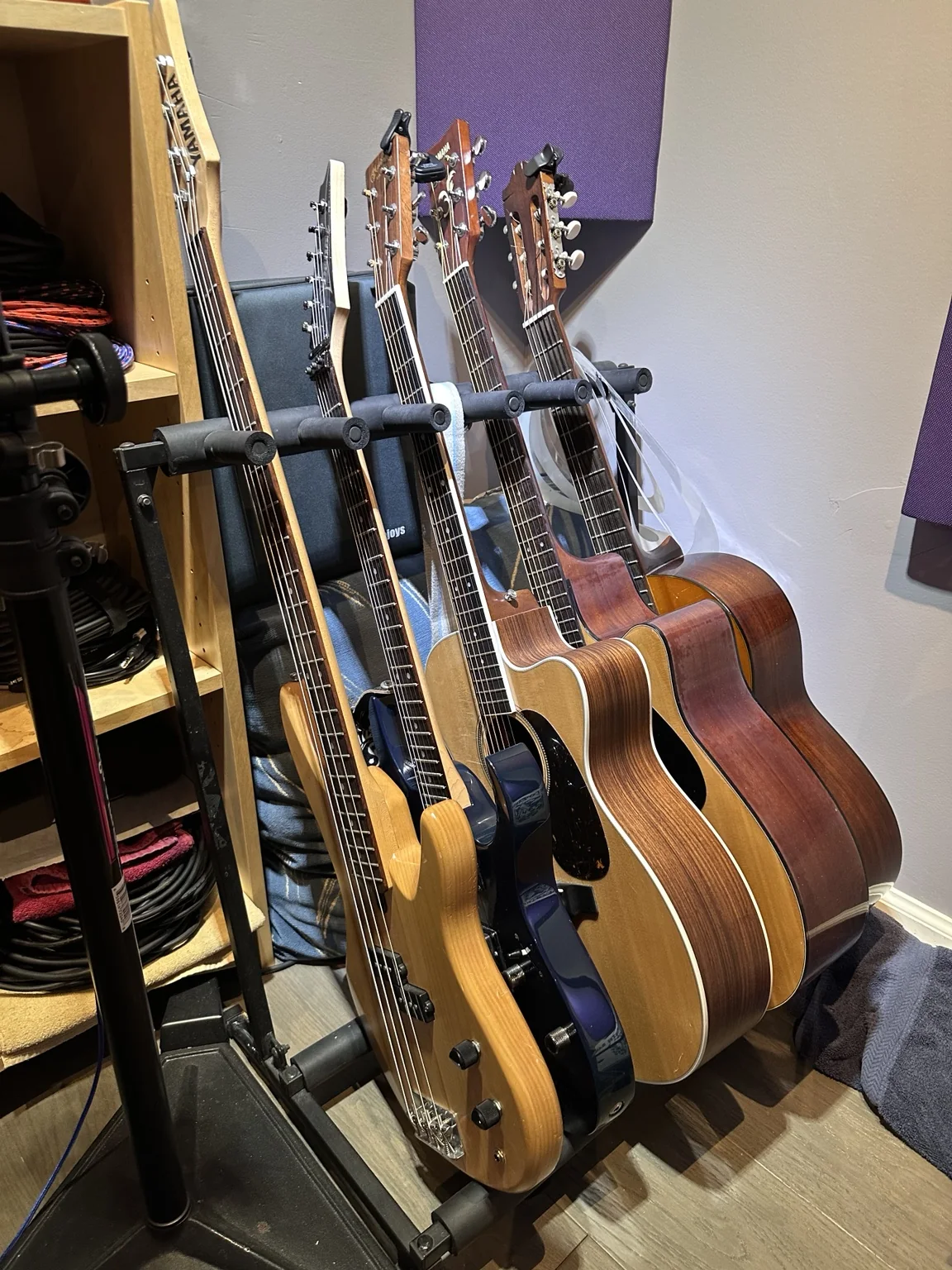 Guitars and basses arranged in the studio